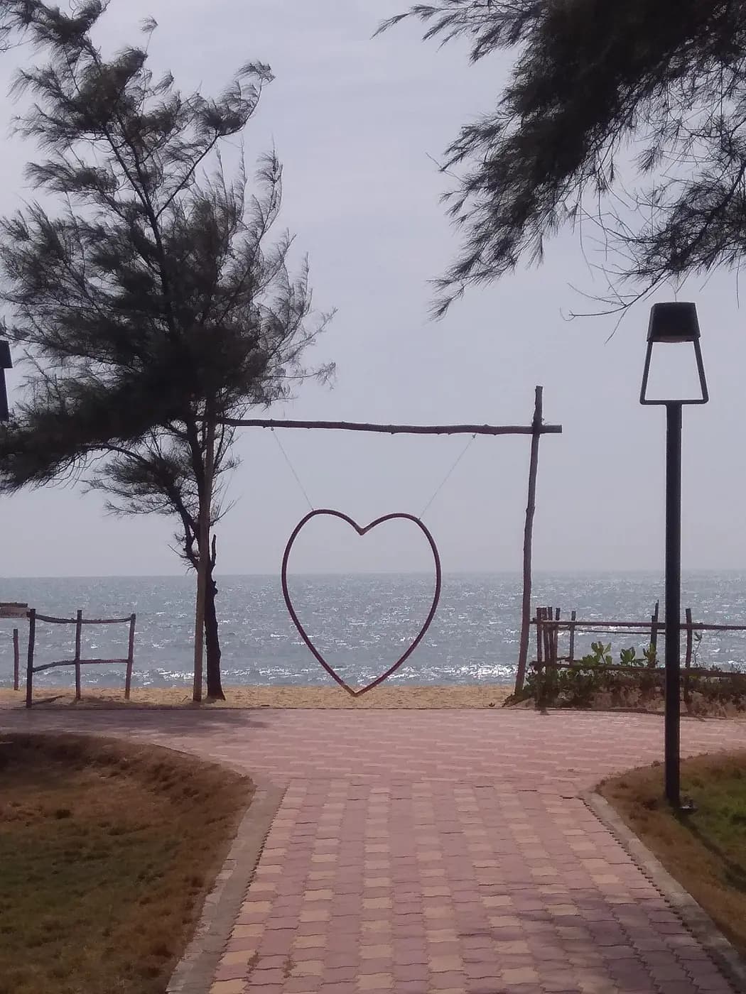 The heart-shaped swing on the promenade of the Blue Flag beach at Padubidri