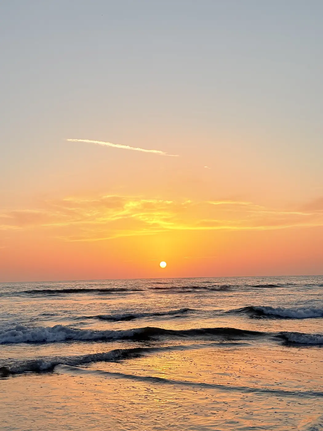 The sun going down into the Arabian Sea on the coast south of Padubidri