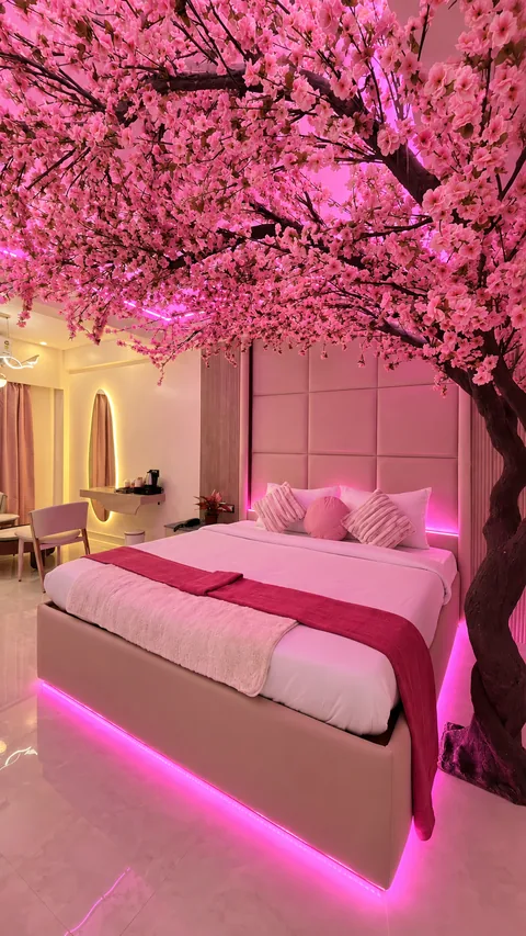Cherry Blossom Suite at SeaSwara — Blossom canopy, Blush lighting, Seating corner