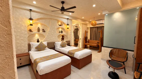 Mud Heritage Suite at SeaSwara — Twin beds, Wooden swing, Heritage details